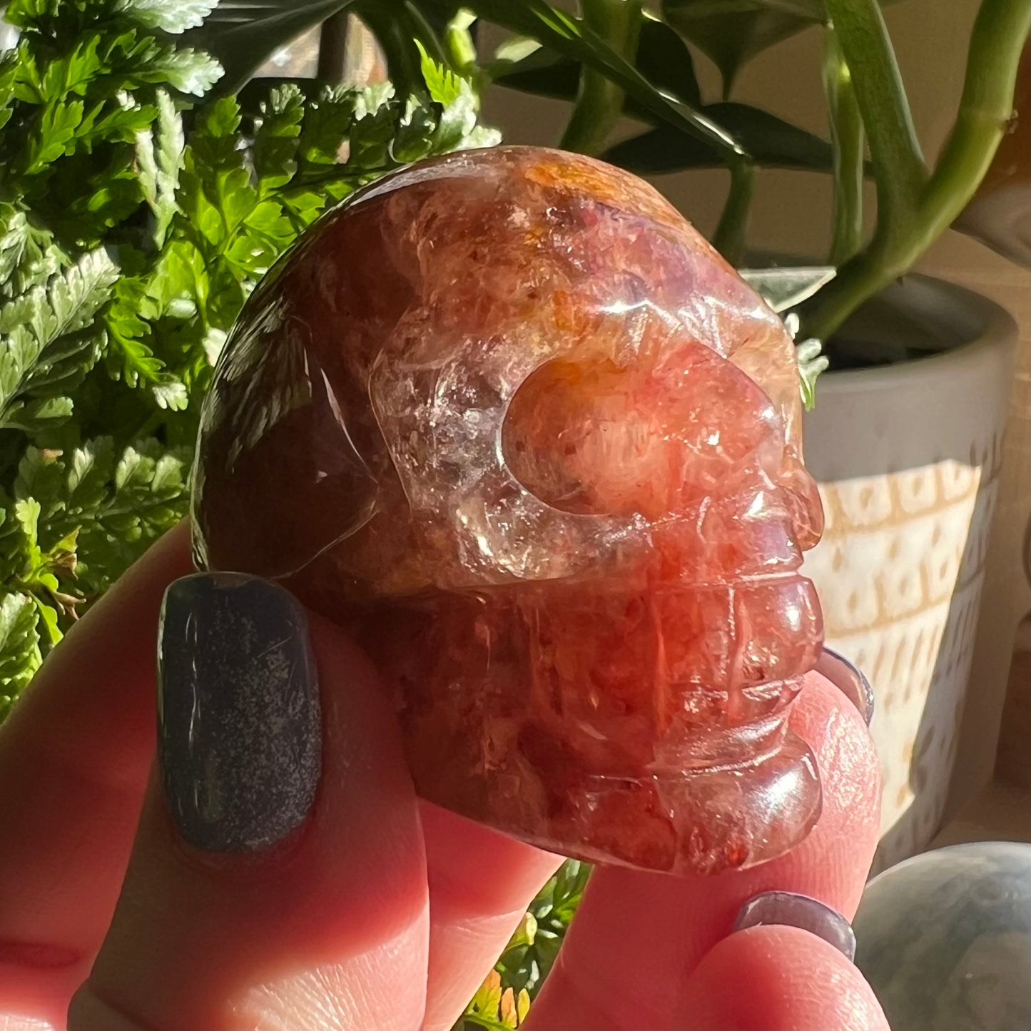 Skull Crystal Carving - Fire Hematite Quartz with Golden Healer sections