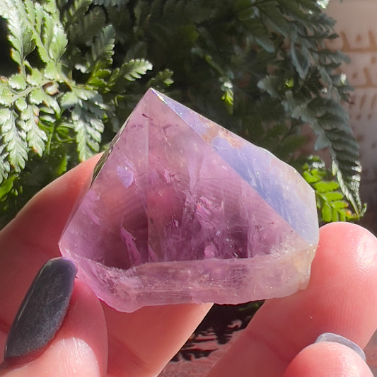 Polished Amethyst point with flat base