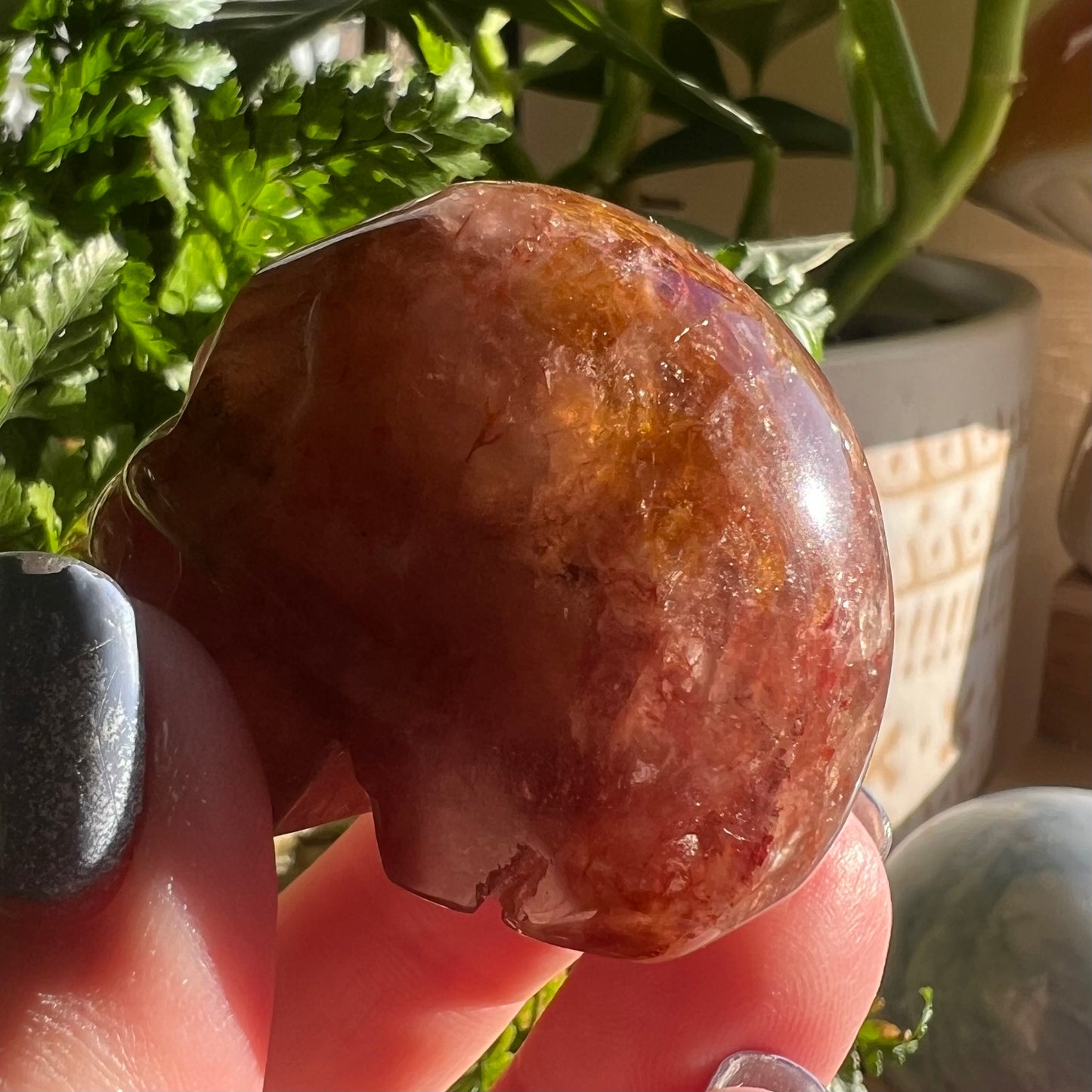 Skull Crystal Carving - Fire Hematite Quartz with Golden Healer sections