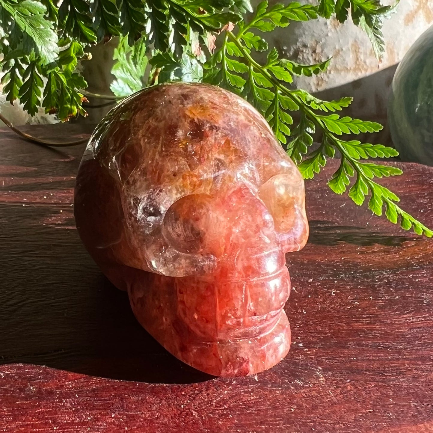Skull Crystal Carving - Fire Hematite Quartz with Golden Healer sections