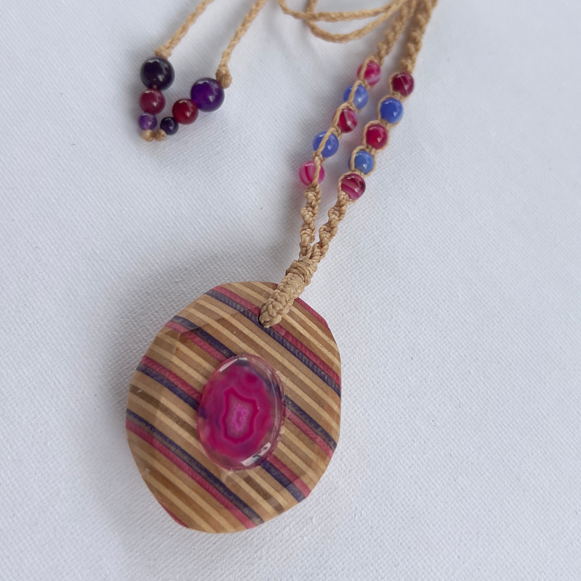Handmade, unique recycled skateboard pendant with embedded Dyed Agate Druzy Cabochone on an adjustable macrame necklace cord woven with Dyed Agate beading