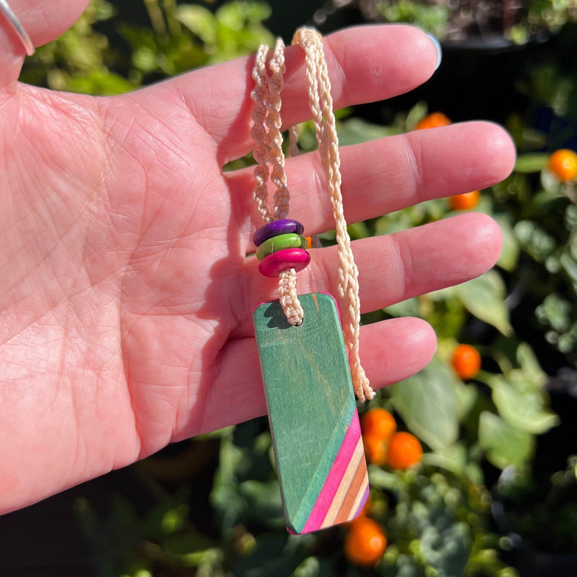 Adjustable handmade Macrame Necklace with Recycled Skateboard Pendant and Magnesite in Blue, Pink, Orange and purple colours