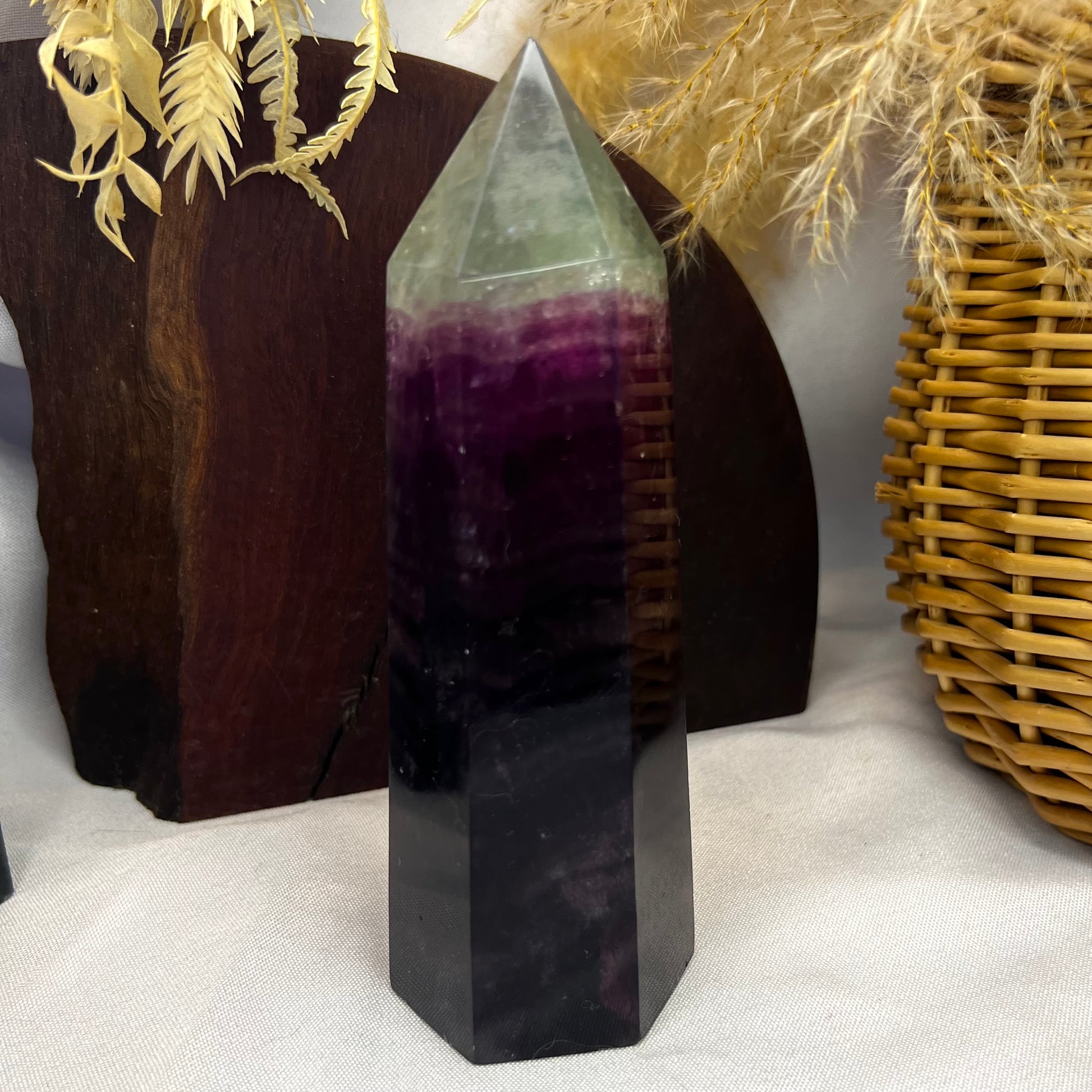 Gorgeous, large polished Purple banded Fluorite Tower with gorgeous icy green with rainbows.
