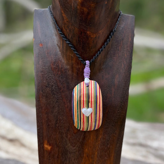 Handmade, unique recycled skateboard pendant with flashy Moonstone heart embedded cabochon on an adjustable macrame necklace cord.