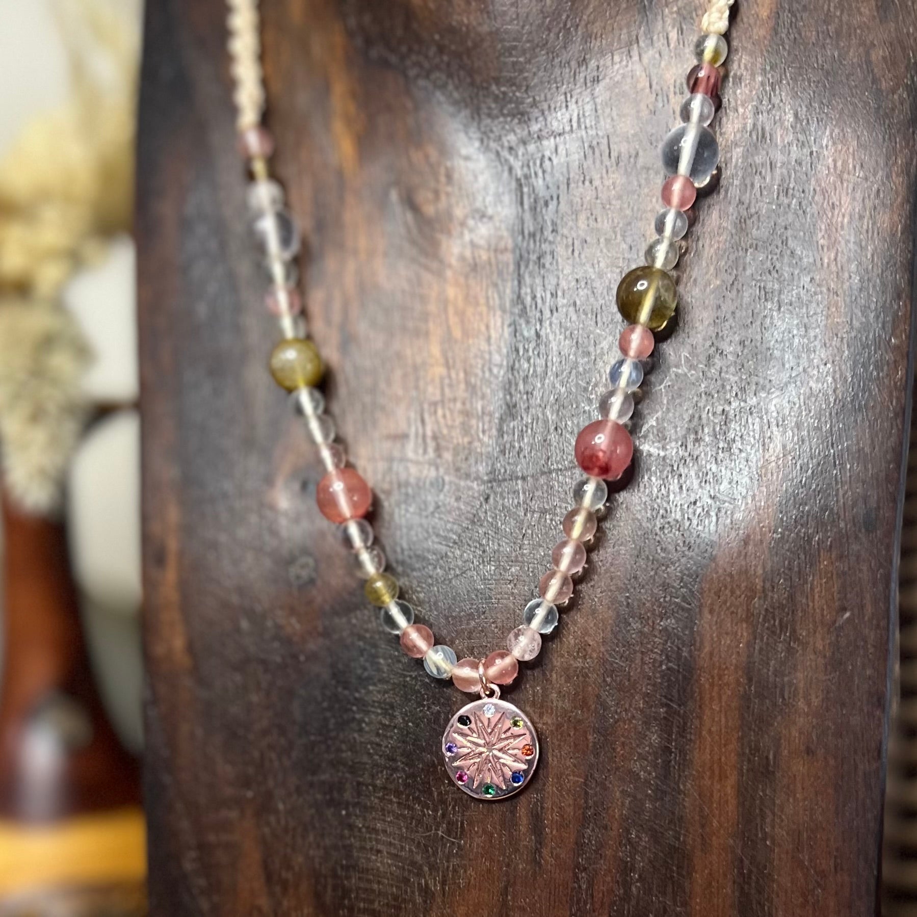 Handmade adjustable macrame necklace with Rose Gold Celestial Star Wheel Charm pendant and Fire Quartz with Cherry Quartz beading