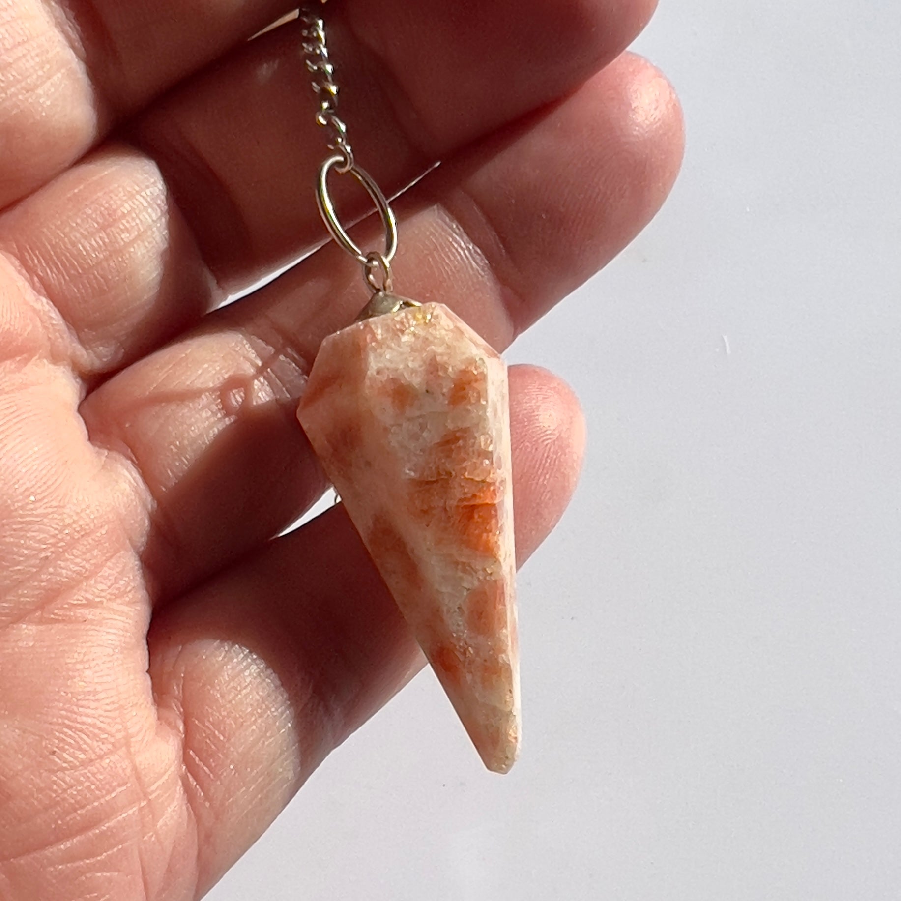 Sunstone Pendulum - Sunstone is a crystal of strength, leadership and personal power.