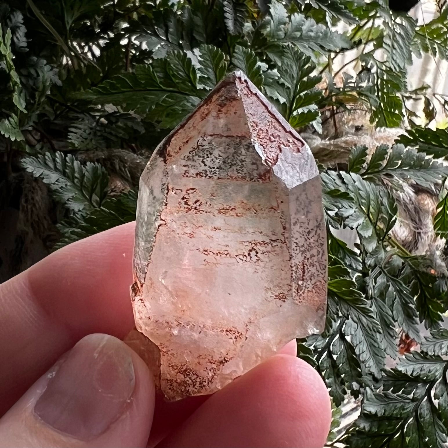 natural etched quartz with chlorite and hematite inclusions