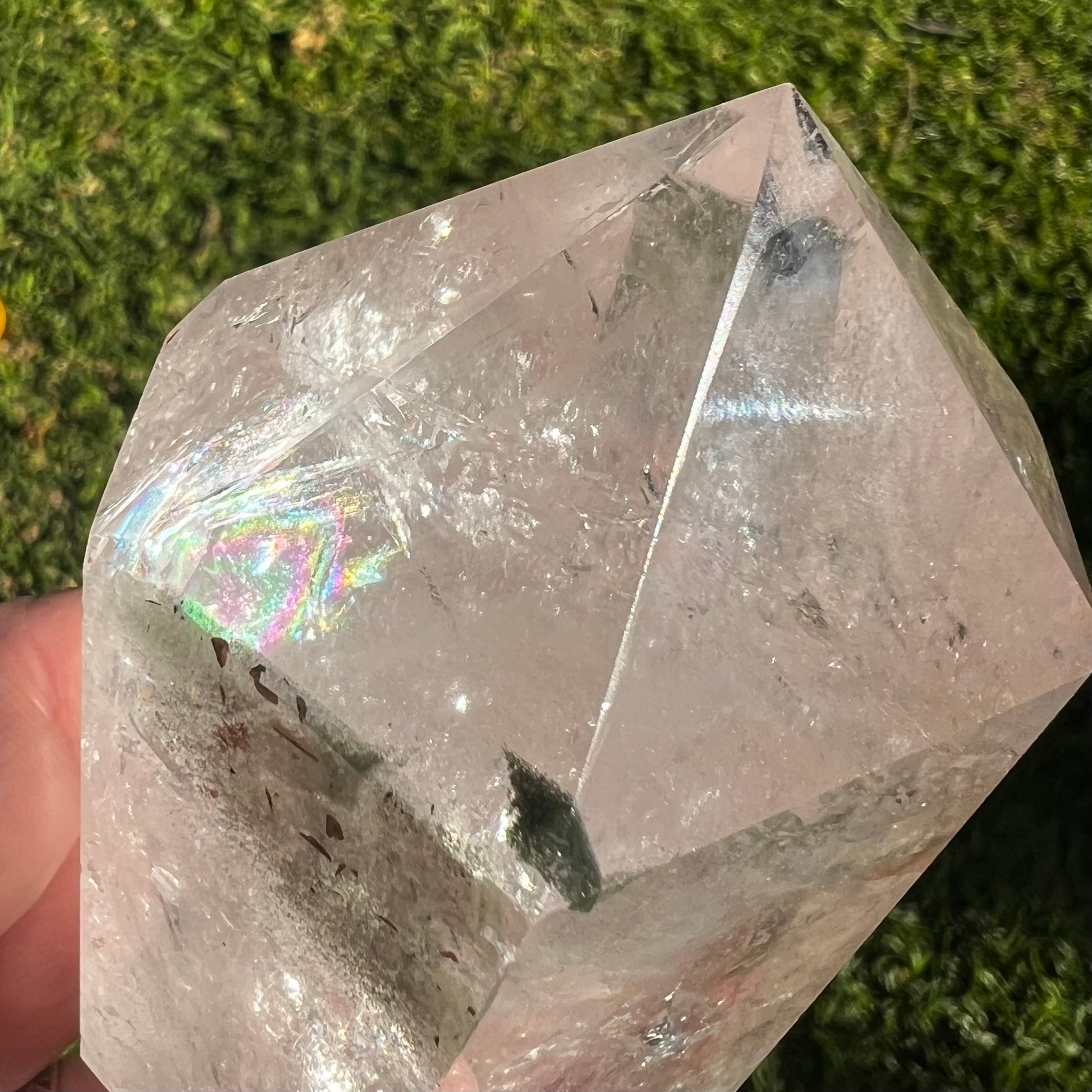 Rainbow filled inclusion Quartz point