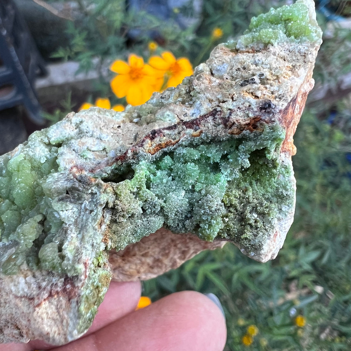 A third cluster of pyromorphite under the mineral specimen edge