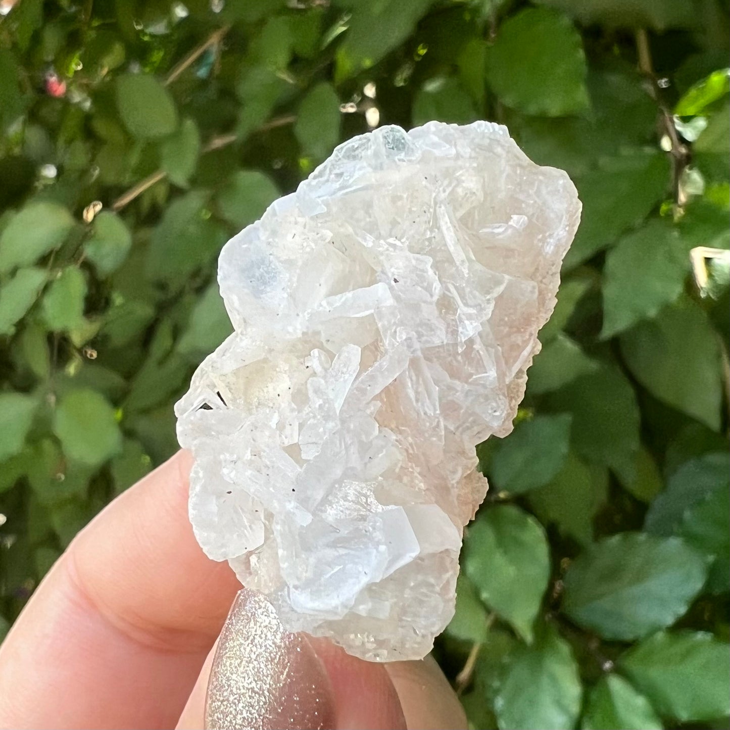 White calcite over pink sugary druzy apophyllite
