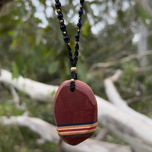 Red White and Blue Macrame Necklace with Wood and Recycled Skateboard Pendant and Magnesite woven on Black Linhasita cord with Brass and Onyx beads